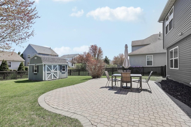 11176 Fleetwood St, Huntley, IL 60142 - fenced backyard featuring a patio area and a storage unit