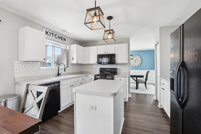 11176 Fleetwood St, Huntley, IL 60142 - kitchen with black appliances, light countertops, backsplash, and dark wood-style floors