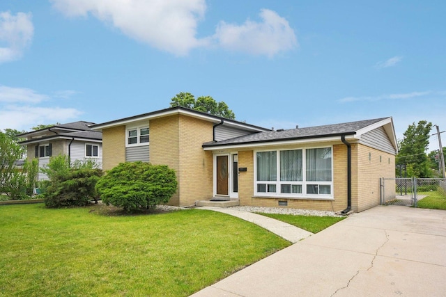 9342 Oriole Ave, Morton Grove, IL 60053 - split level home with brick siding and concrete driveway