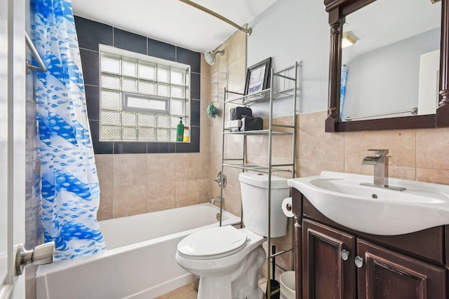 9342 Oriole Ave, Morton Grove, IL 60053 - bathroom featuring tile walls, shower / bath combination with curtain, and vanity