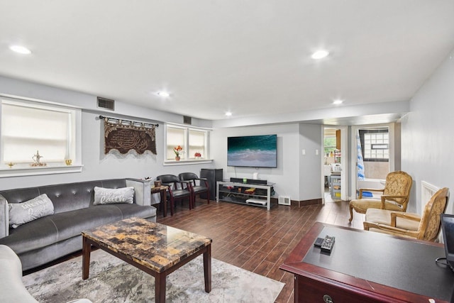 9342 Oriole Ave, Morton Grove, IL 60053 - living area featuring dark wood-style floors and recessed lighting