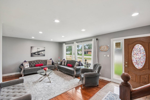 9342 Oriole Ave, Morton Grove, IL 60053 - living area with wood finished floors and recessed lighting