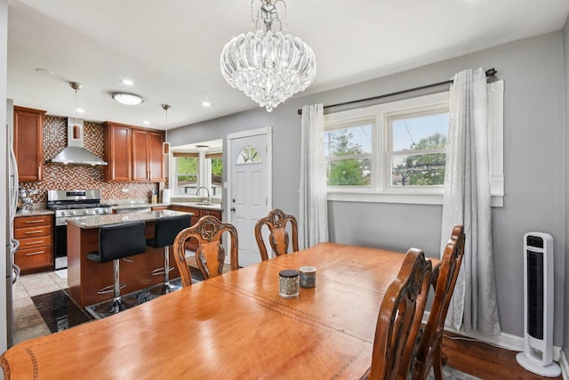 9342 Oriole Ave, Morton Grove, IL 60053 - dining area featuring a chandelier and recessed lighting