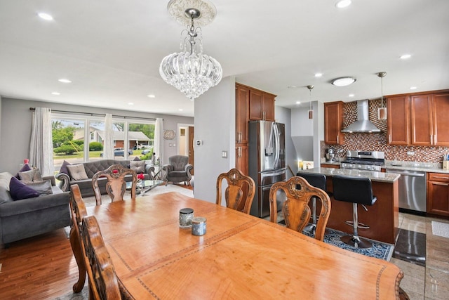 9342 Oriole Ave, Morton Grove, IL 60053 - dining area featuring recessed lighting, a chandelier, and light wood-type flooring