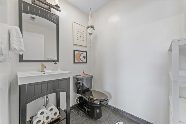 1307 S Wabash Ave Unit 413, Chicago, IL 60605 - half bath with vanity and tile patterned floors
