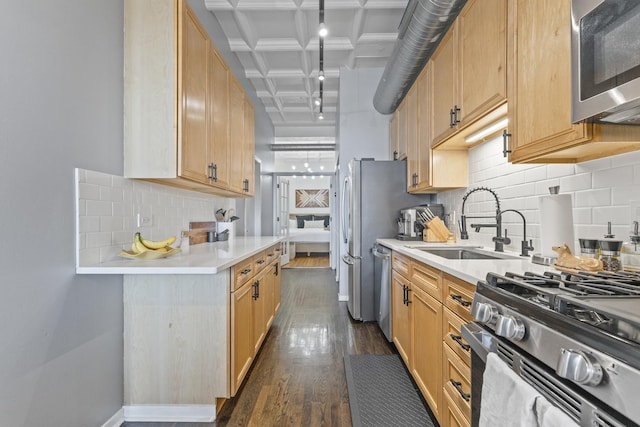 1307 S Wabash Ave Unit 413, Chicago, IL 60605 - kitchen featuring appliances with stainless steel finishes, dark wood finished floors, light countertops, backsplash, and coffered ceiling