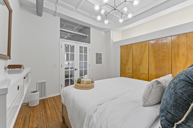 1307 S Wabash Ave Unit 413, Chicago, IL 60605 - bedroom featuring french doors, dark wood-style floors, and electric panel