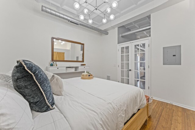 1307 S Wabash Ave Unit 413, Chicago, IL 60605 - bedroom featuring electric panel, french doors, wood finished floors, and access to exterior
