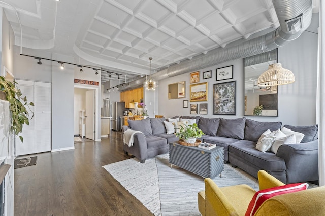 1307 S Wabash Ave Unit 413, Chicago, IL 60605 - living area featuring track lighting, dark wood finished floors, and a chandelier