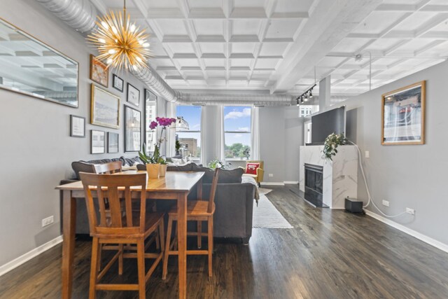 1307 S Wabash Ave Unit 413, Chicago, IL 60605 - dining room featuring dark wood-type flooring, a premium fireplace, coffered ceiling, and beamed ceiling