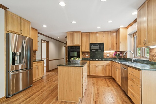 6513 High Meadow Ct, Long Grove, IL 60047 - kitchen with black appliances, light brown cabinets, light wood finished floors, a center island, and tasteful backsplash