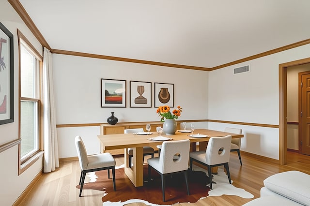6513 High Meadow Ct, Long Grove, IL 60047 - dining room with light wood finished floors and crown molding