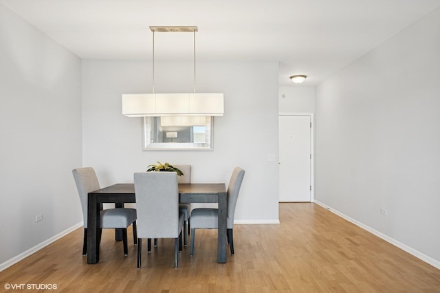 11 S Wille St Unit 709, Mount Prospect, IL 60056 - dining area featuring light wood-style flooring