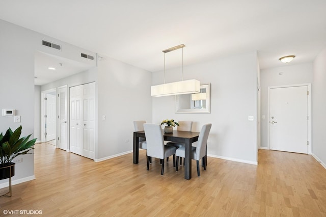 11 S Wille St Unit 709, Mount Prospect, IL 60056 - dining area with light wood-style floors and baseboards