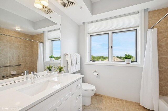 11 S Wille St Unit 709, Mount Prospect, IL 60056 - bathroom featuring vanity, tile patterned floors, and shower / bath combo