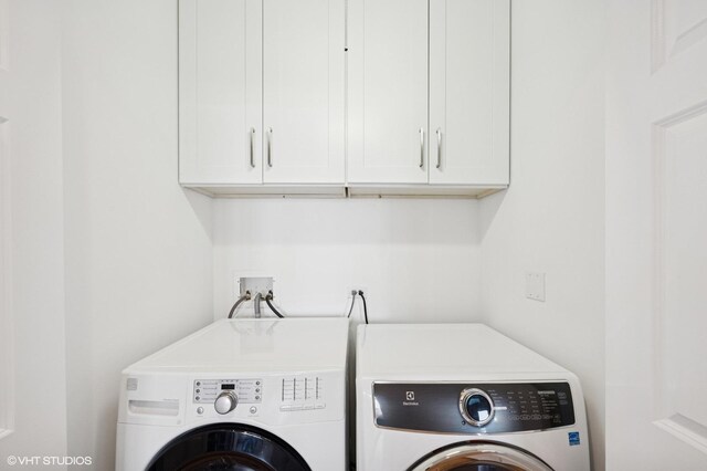 11 S Wille St Unit 709, Mount Prospect, IL 60056 - laundry area with cabinet space and washer and clothes dryer