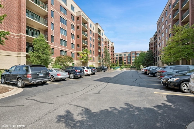 11 S Wille St Unit 709, Mount Prospect, IL 60056 - view of apartment building / complex featuring uncovered parking