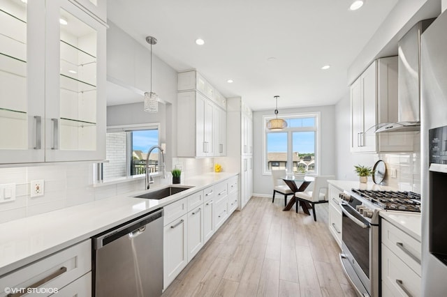 11 S Wille St Unit 709, Mount Prospect, IL 60056 - kitchen featuring appliances with stainless steel finishes, healthy amount of natural light, white cabinets, and recessed lighting
