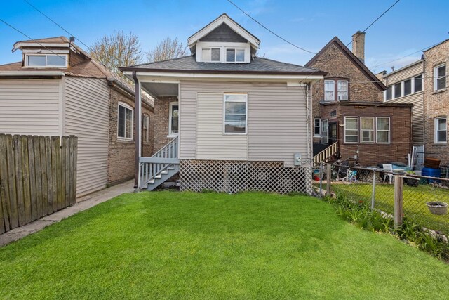 5407 S Justine St, Chicago, IL 60609 - back of property featuring a shingled roof
