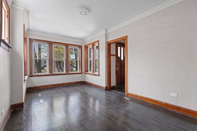 5407 S Justine St, Chicago, IL 60609 - spare room with dark wood finished floors, crown molding, and a smoke detector