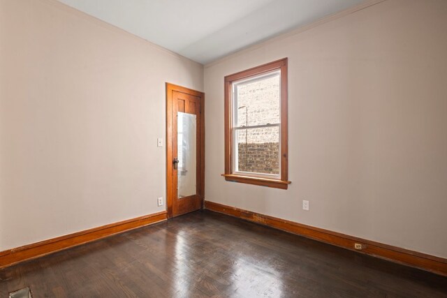 5407 S Justine St, Chicago, IL 60609 - empty room with dark wood-style floors