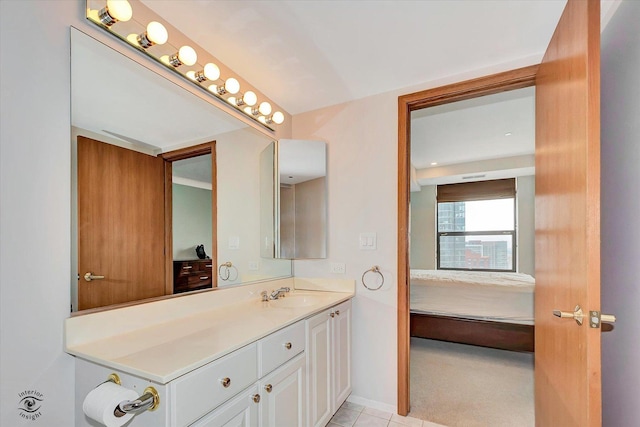 910 S Michigan Ave Unit 1712, Chicago, IL 60605 - bathroom featuring vanity, connected bathroom, and tile patterned floors