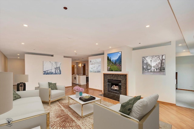 910 S Michigan Ave Unit 1712, Chicago, IL 60605 - living area with light wood-type flooring, recessed lighting, and a fireplace