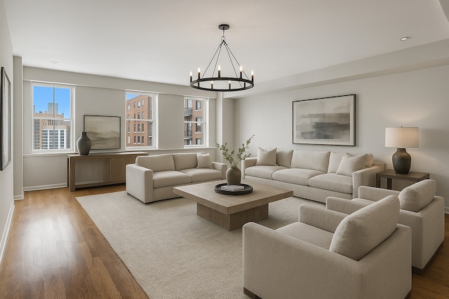 40 E 9th St Unit 1609, Chicago, IL 60605 - living area featuring a chandelier and wood finished floors
