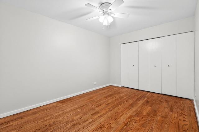 40 E 9th St Unit 1609, Chicago, IL 60605 - unfurnished bedroom with wood finished floors, a closet, and a ceiling fan