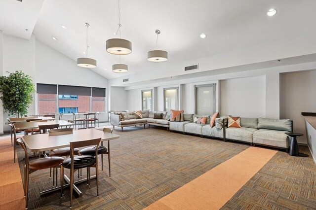 40 E 9th St Unit 1609, Chicago, IL 60605 - carpeted living area with high vaulted ceiling and recessed lighting