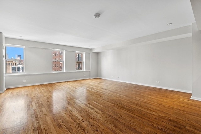 40 E 9th St Unit 1609, Chicago, IL 60605 - spare room with wood finished floors and a smoke detector