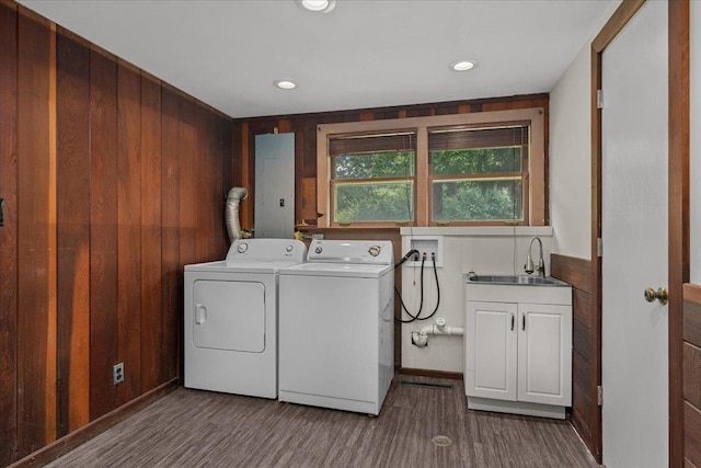1719 Ferndale Ave, Northbrook, IL 60062 - laundry room with cabinet space, electric panel, washer and dryer, dark wood-style floors, and wooden walls