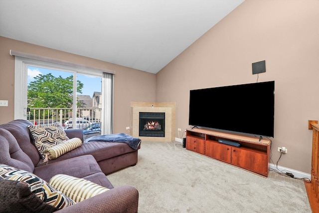 5227 Cobblers Xing Unit 5227, Mchenry, IL 60050 - carpeted living area with vaulted ceiling and a tile fireplace