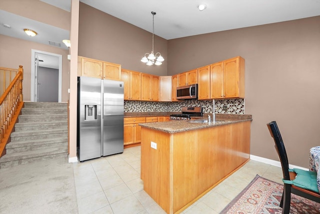 5227 Cobblers Xing Unit 5227, Mchenry, IL 60050 - kitchen featuring stainless steel appliances, backsplash, high vaulted ceiling, a peninsula, and light tile patterned floors
