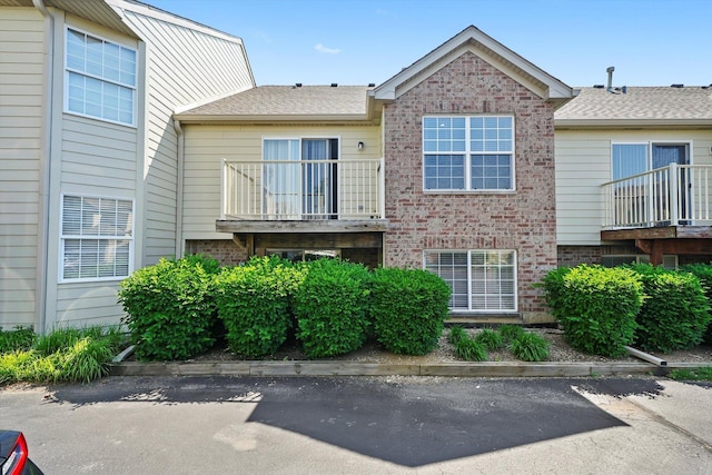 5227 Cobblers Xing Unit 5227, Mchenry, IL 60050 - view of front of home with brick siding and a balcony