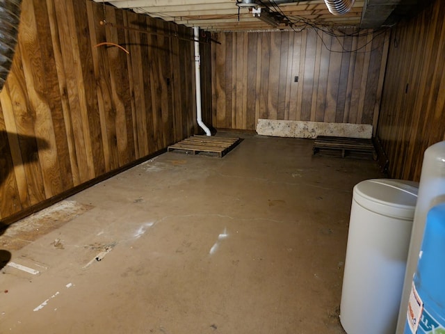 8788 Sheffield Dr, Belvidere, IL 61008 - unfinished basement featuring a water softener system and wood walls