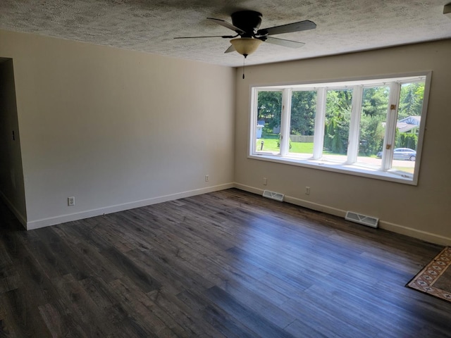 8788 Sheffield Dr, Belvidere, IL 61008 - unfurnished room featuring a ceiling fan, a textured ceiling, and dark wood-style floors