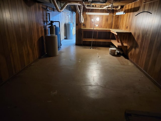 8788 Sheffield Dr, Belvidere, IL 61008 - unfinished below grade area featuring wood walls and a water softener system