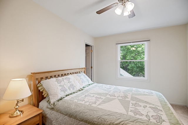 145 Barnes Rd, Elgin, IL 60124 - carpeted bedroom with baseboards and ceiling fan