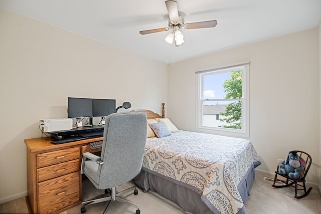 145 Barnes Rd, Elgin, IL 60124 - bedroom with light carpet, ceiling fan, and an office area