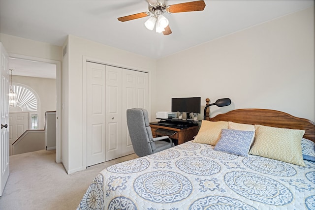 145 Barnes Rd, Elgin, IL 60124 - bedroom with light colored carpet, a closet, a ceiling fan, and a desk