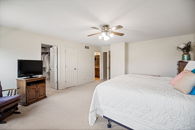 145 Barnes Rd, Elgin, IL 60124 - bedroom with light colored carpet and a ceiling fan