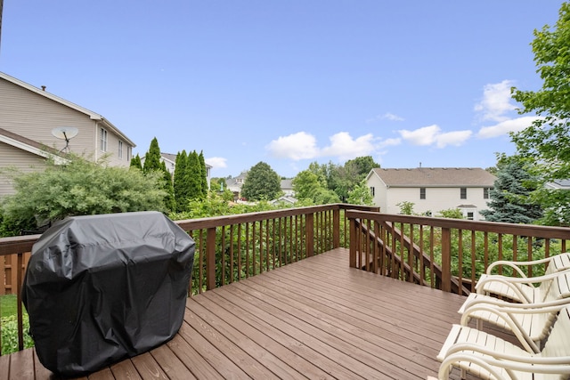 145 Barnes Rd, Elgin, IL 60124 - wooden terrace featuring area for grilling and a residential view