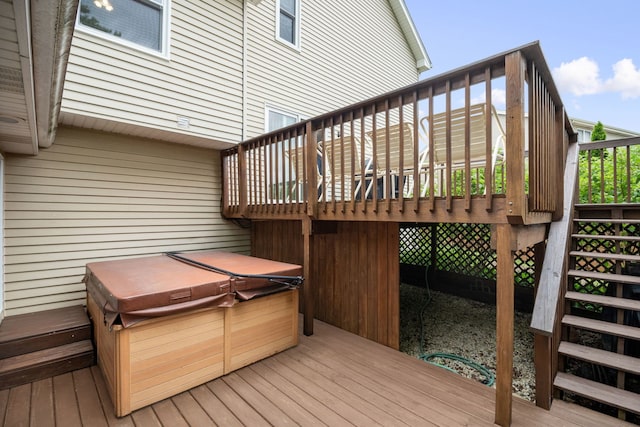 145 Barnes Rd, Elgin, IL 60124 - wooden deck with a hot tub and stairway