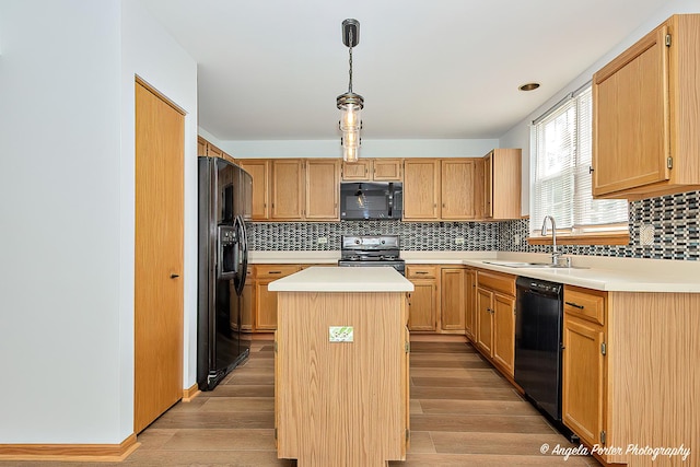 179 Cascade Dr, Crystal Lake, IL 60012 - kitchen with black appliances, light countertops, backsplash, and light wood-style flooring