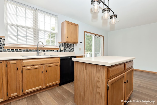 179 Cascade Dr, Crystal Lake, IL 60012 - kitchen featuring dishwasher, backsplash, light wood-style flooring, and light countertops