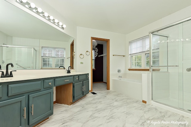 179 Cascade Dr, Crystal Lake, IL 60012 - full bathroom with double vanity, a stall shower, a bath, and marble look tile flooring