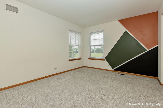 179 Cascade Dr, Crystal Lake, IL 60012 - carpeted empty room with baseboards