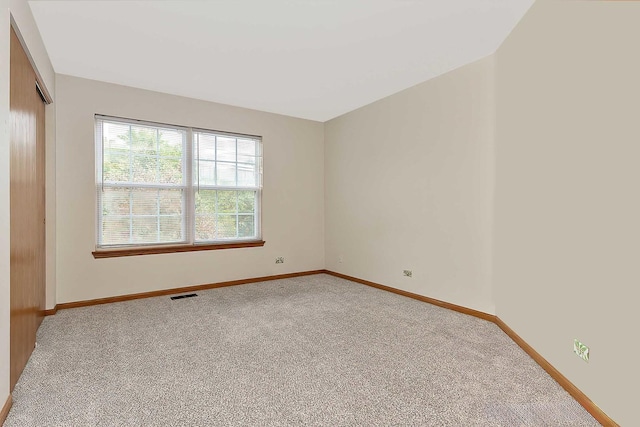 179 Cascade Dr, Crystal Lake, IL 60012 - unfurnished room featuring carpet and baseboards