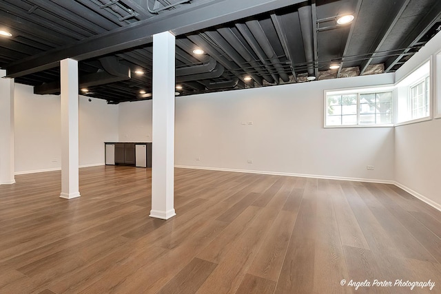 179 Cascade Dr, Crystal Lake, IL 60012 - below grade area with wood finished floors and baseboards